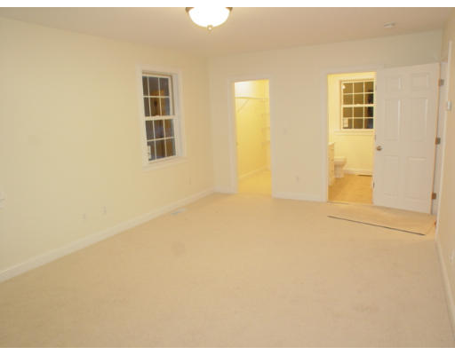 42 South Hampton Road Amesbury, MA 01913 - Photo 7 of 14 a view of empty room with windows