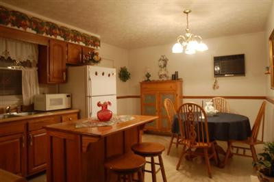 13 Raintree Court Irvine, KY 40336 - Photo 4 of 9 Large oak kitchen.