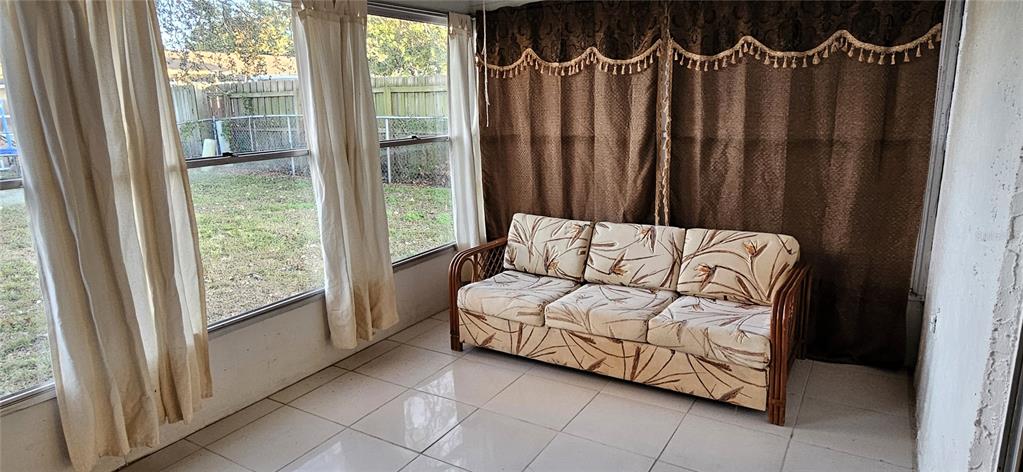 9116 Chantilly Lane Port Richey, FL 34668 - Photo 16 of 30 Enclosed patio