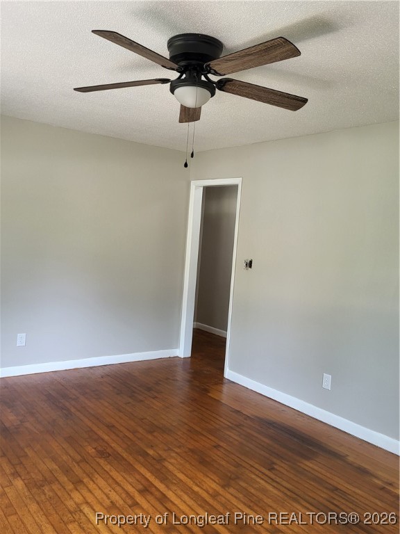 182 Summerhill Road Fayetteville, NC 28303 - Photo 13 of 24 a view of an empty room with wooden floor