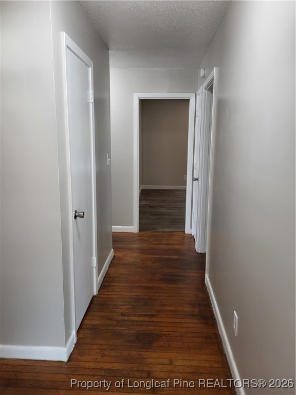 182 Summerhill Road Fayetteville, NC 28303 - Photo 15 of 24 a view of a hallway with wooden floor and stairs