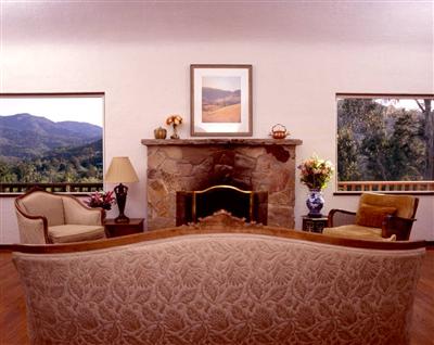 249 Crescent Road San Anselmo, CA 94960 - Photo 5 of 7 a living room with furniture and a fireplace