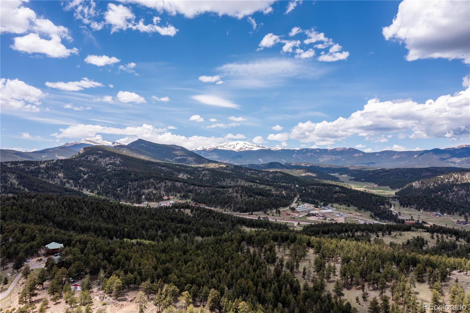 278 Overlook Drive Bailey, CO 80421 - Photo 30 of 37 a view of a lake with mountains in the background