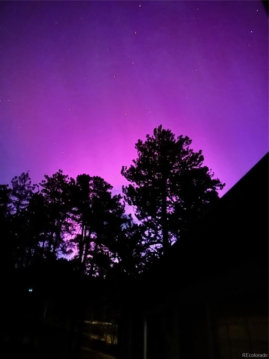 278 Overlook Drive Bailey, CO 80421 - Photo 35 of 37 a view of a sunset