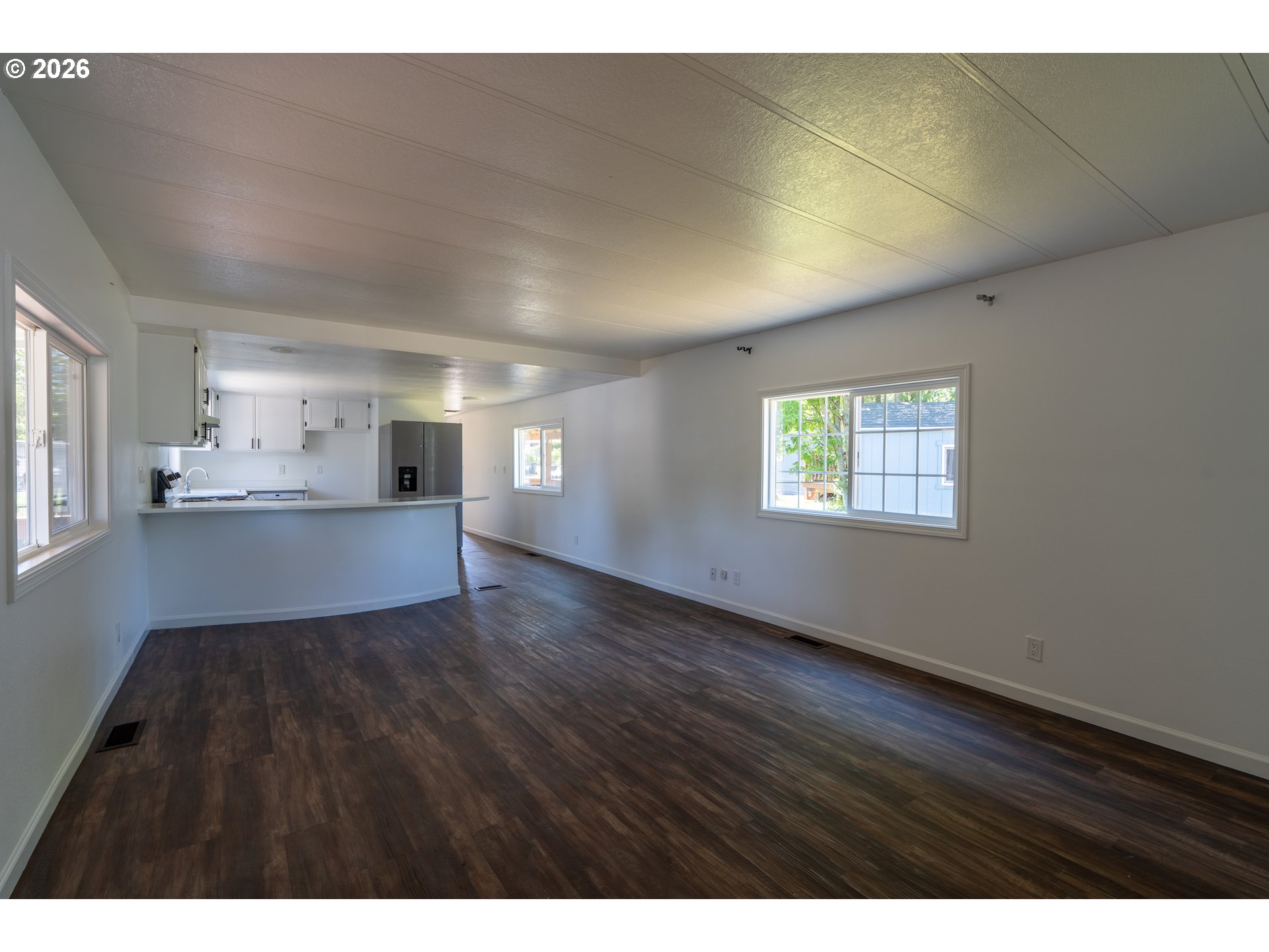 15619 Northeast Caples Road, Unit 128 Brush Prairie, WA 98606 - Photo 6 of 30 Living Room/Entrance