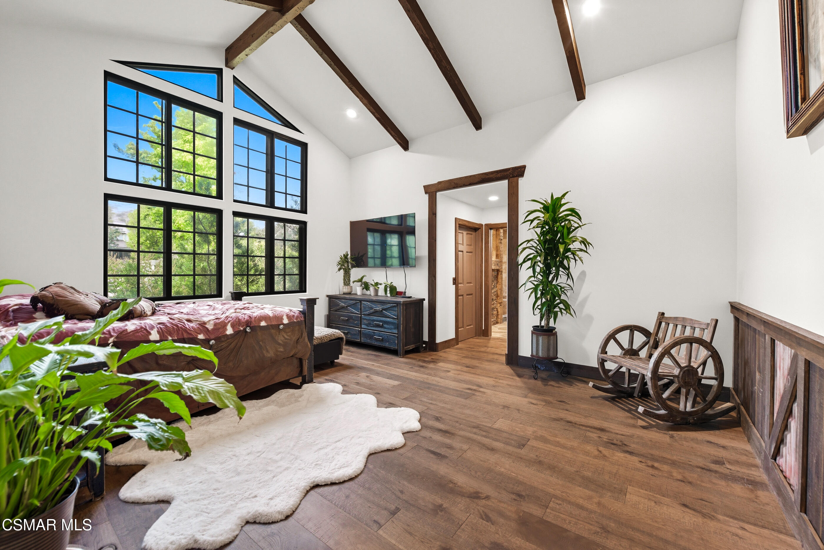 4351 Cornell Road Agoura Hills, CA 91301 - Photo 11 of 33 a living room with furniture and a potted plant