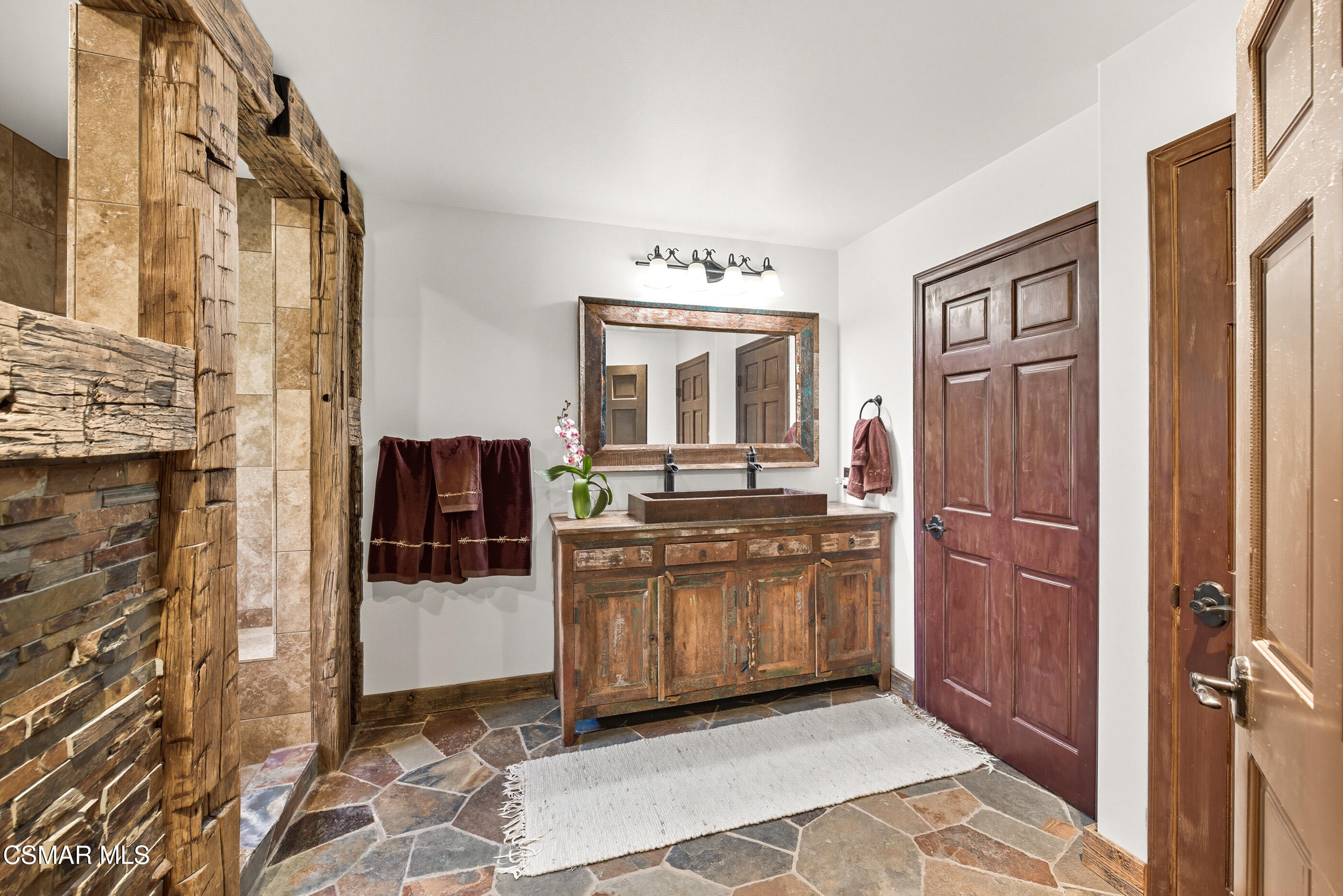 4351 Cornell Road Agoura Hills, CA 91301 - Photo 14 of 33 a kitchen with stainless steel appliances granite countertop a refrigerator and a sink