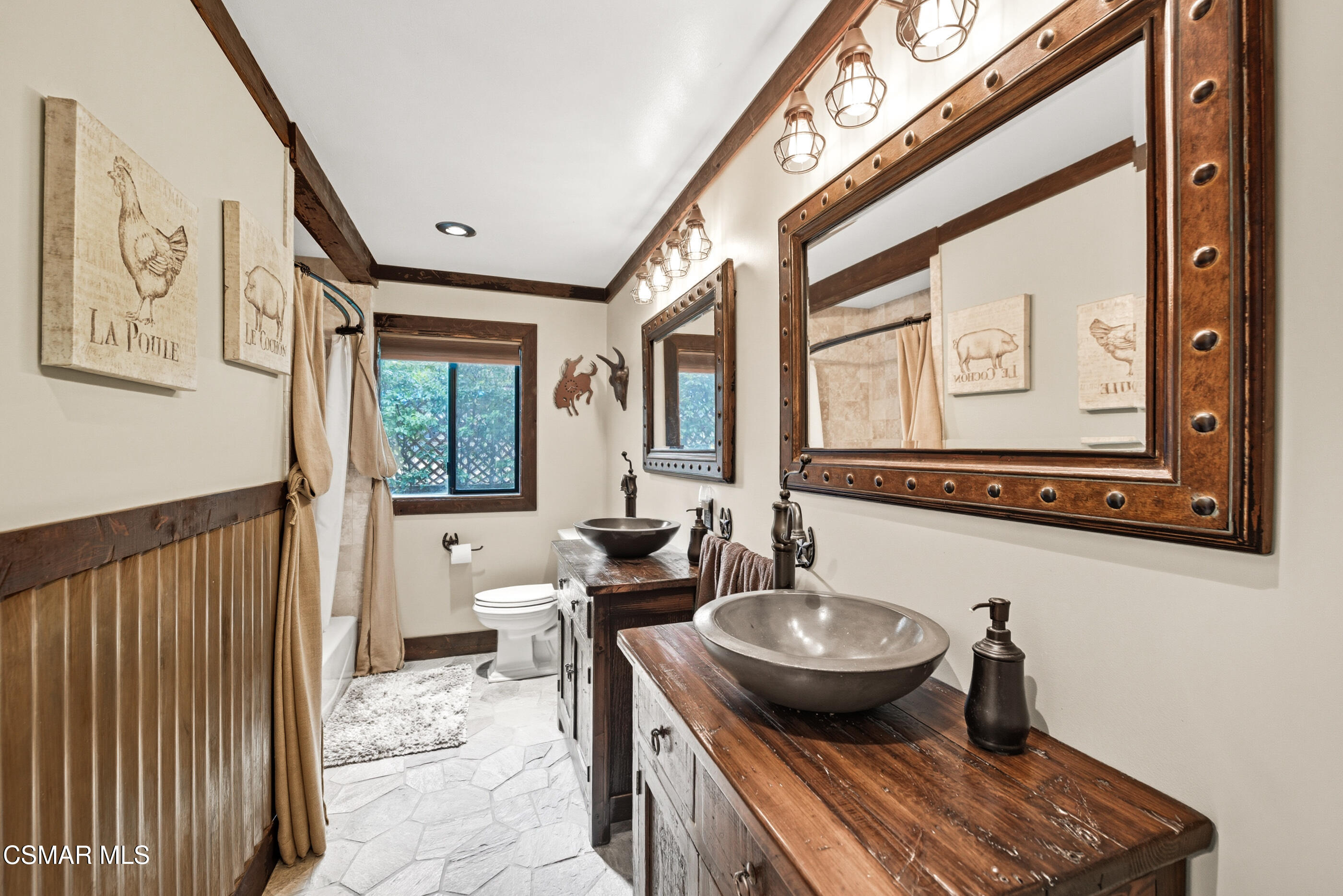 4351 Cornell Road Agoura Hills, CA 91301 - Photo 17 of 33 a bathroom with a toilet a sink and a mirror