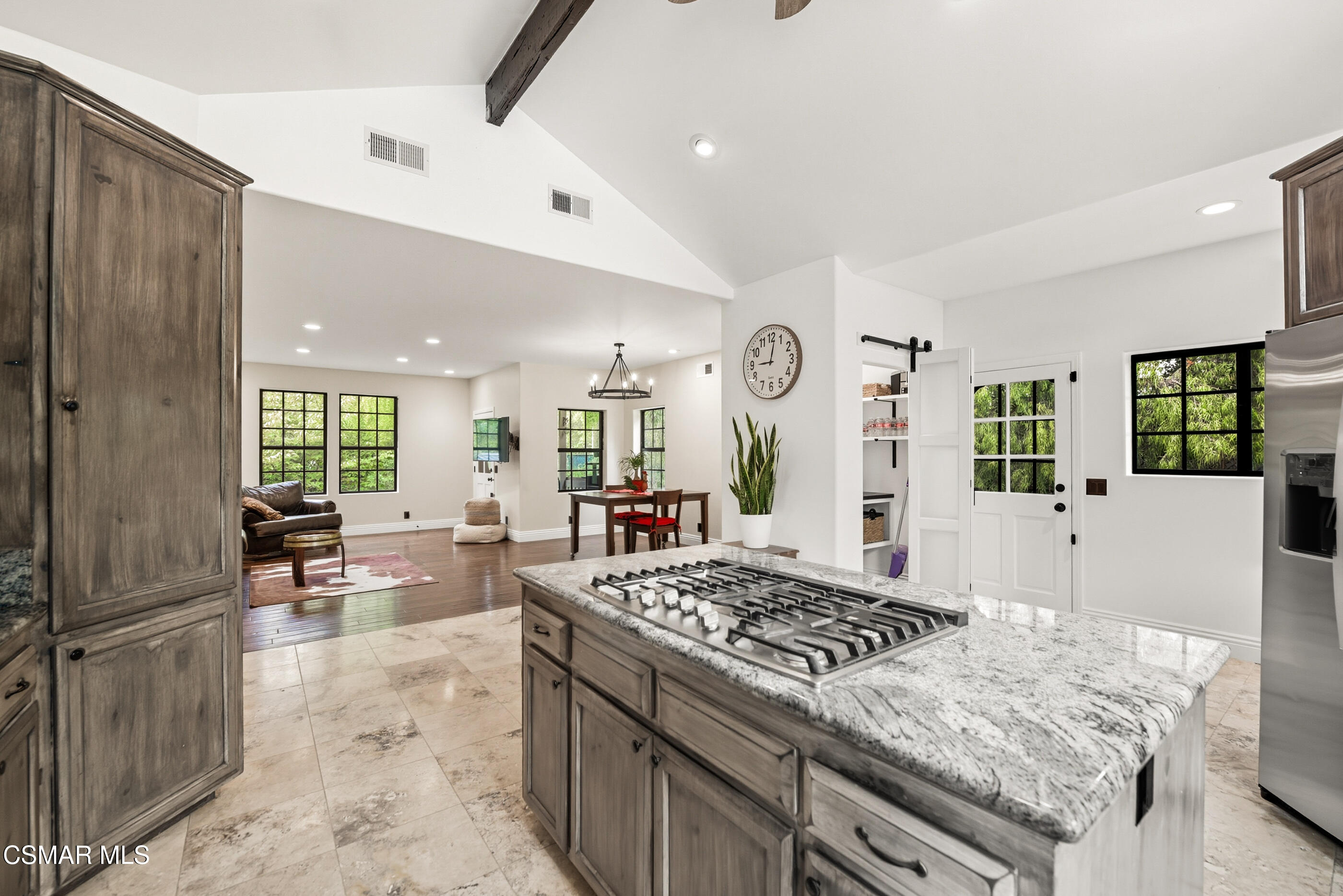 4351 Cornell Road Agoura Hills, CA 91301 - Photo 9 of 33 a living room with furniture and a table