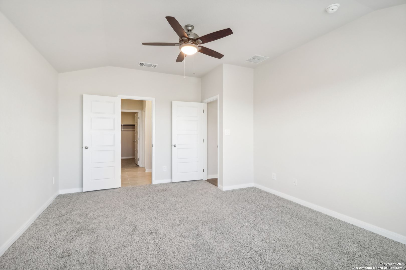 2907 Junction Bay Converse, TX 78109 - Photo 18 of 21 an empty room with ceiling fan and window