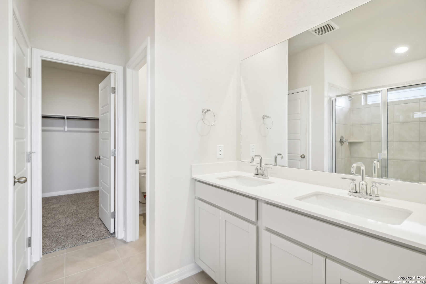 2907 Junction Bay Converse, TX 78109 - Photo 19 of 21 a bathroom with a sink double vanity and a mirror
