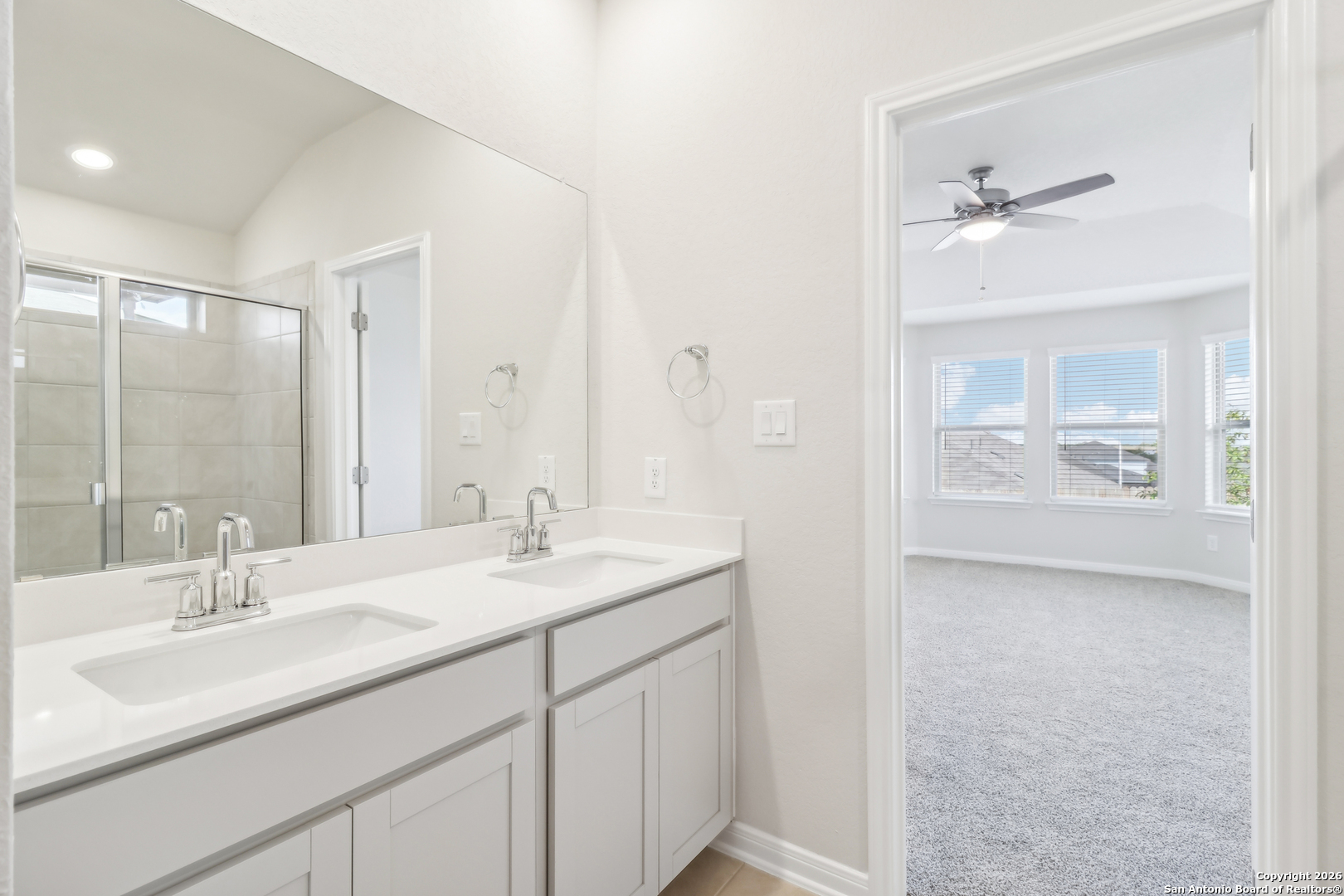 2907 Junction Bay Converse, TX 78109 - Photo 21 of 21 a bathroom with a sink double vanity and a mirror