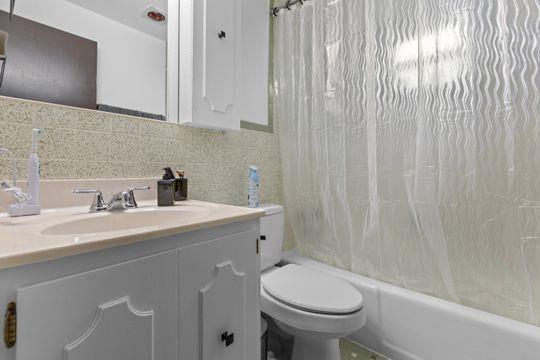 259 Republic Street Pittsburgh, PA 15211 - Photo 23 of 25 a bathroom with a sink a toilet and shower