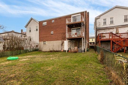 259 Republic Street Pittsburgh, PA 15211 - Photo 4 of 25 a view of a house with backyard and sitting area