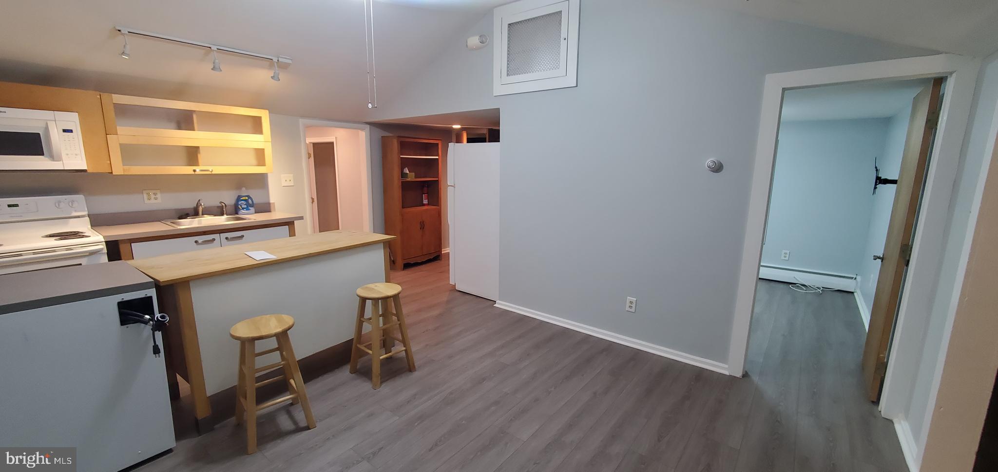 453 Chesapeake Road Charlestown, MD 21914 - Photo 6 of 17 a room with a wooden floor and furniture