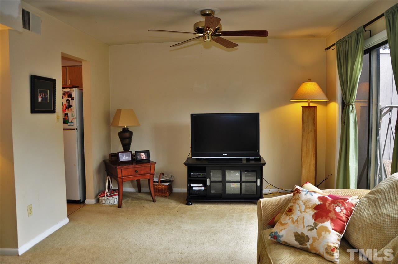 1774 Quail Ridge Road Raleigh, NC 27609 - Photo 11 of 25 a bedroom with a bed and a flat screen tv