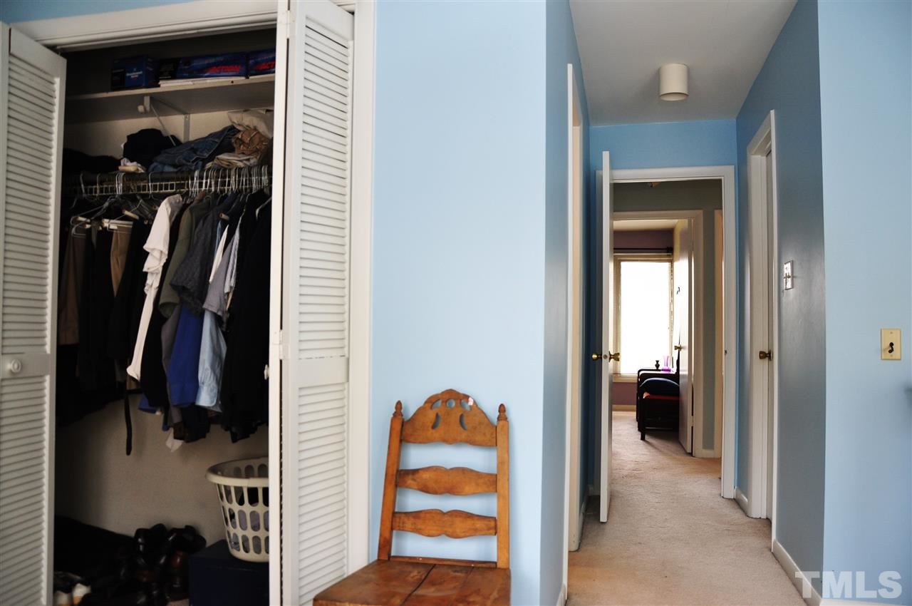 1774 Quail Ridge Road Raleigh, NC 27609 - Photo 16 of 25 a view of walk in closet with clothes and shoes