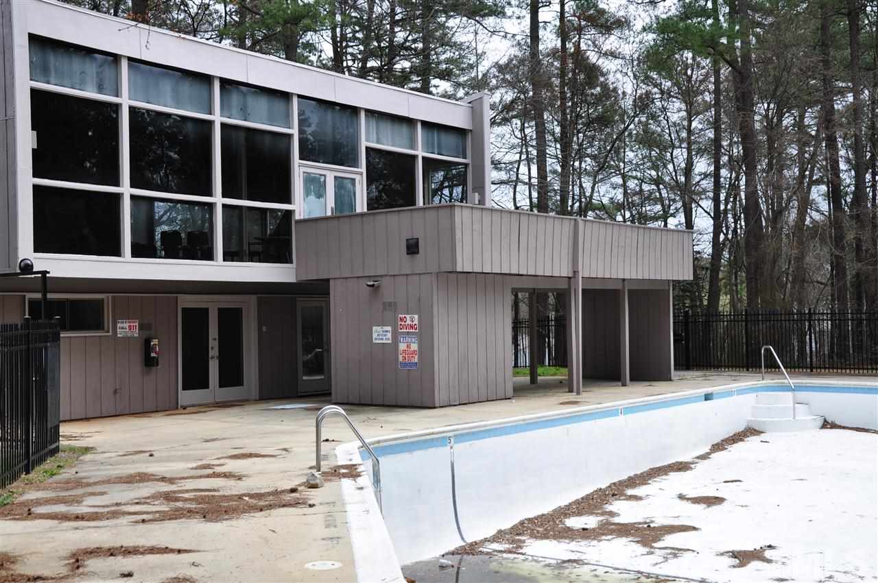 1774 Quail Ridge Road Raleigh, NC 27609 - Photo 25 of 25 a view of a house with a backyard