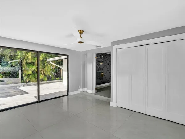 a view of a room with a large window