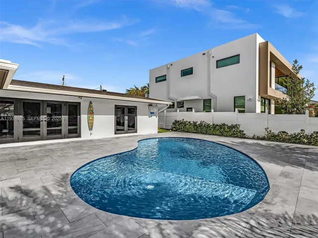a view of a house with roof deck