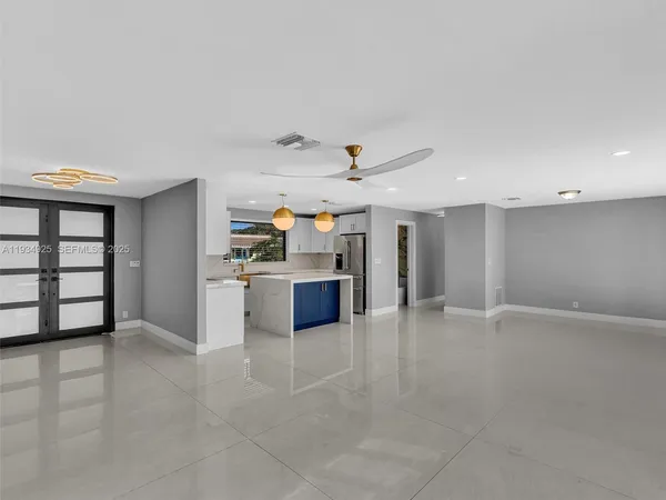 a view of a kitchen with a sink