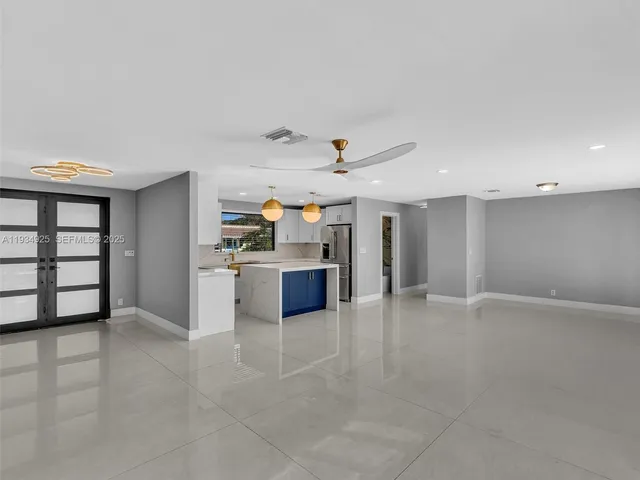 a view of a kitchen with a sink
