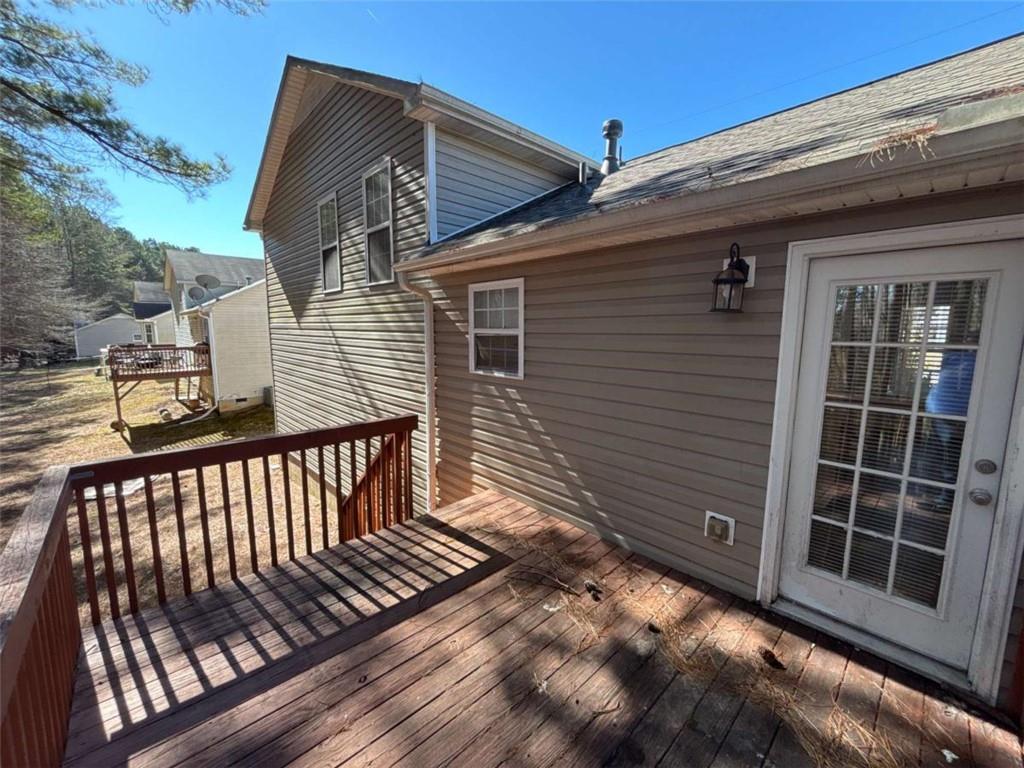 732 Newport Drive Villa Rica, GA 30180 - Photo 17 of 44 a view of backyard with deck