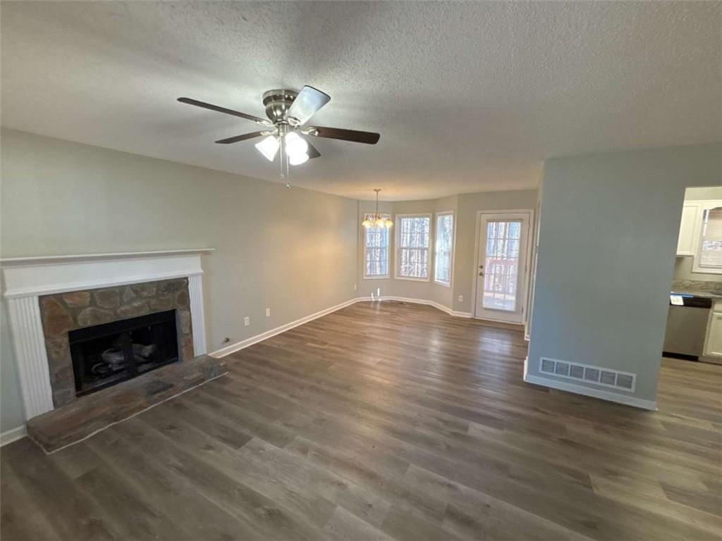 732 Newport Drive Villa Rica, GA 30180 - Photo 18 of 44 a view of empty room with wooden floor and fan