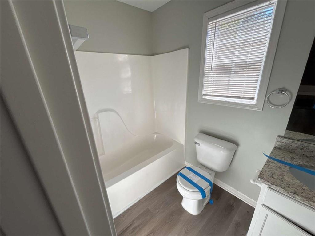 732 Newport Drive Villa Rica, GA 30180 - Photo 22 of 44 a bathroom with a sink and a shower
