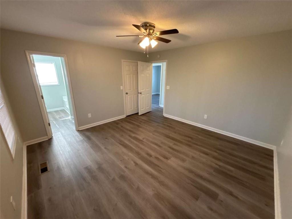 732 Newport Drive Villa Rica, GA 30180 - Photo 31 of 44 a view of an empty room with wooden floor