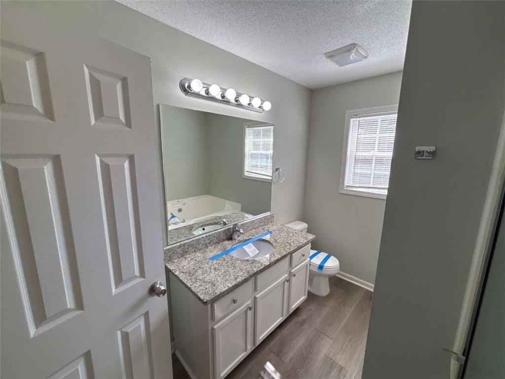 732 Newport Drive Villa Rica, GA 30180 - Photo 36 of 44 a bedroom with a bed and a window