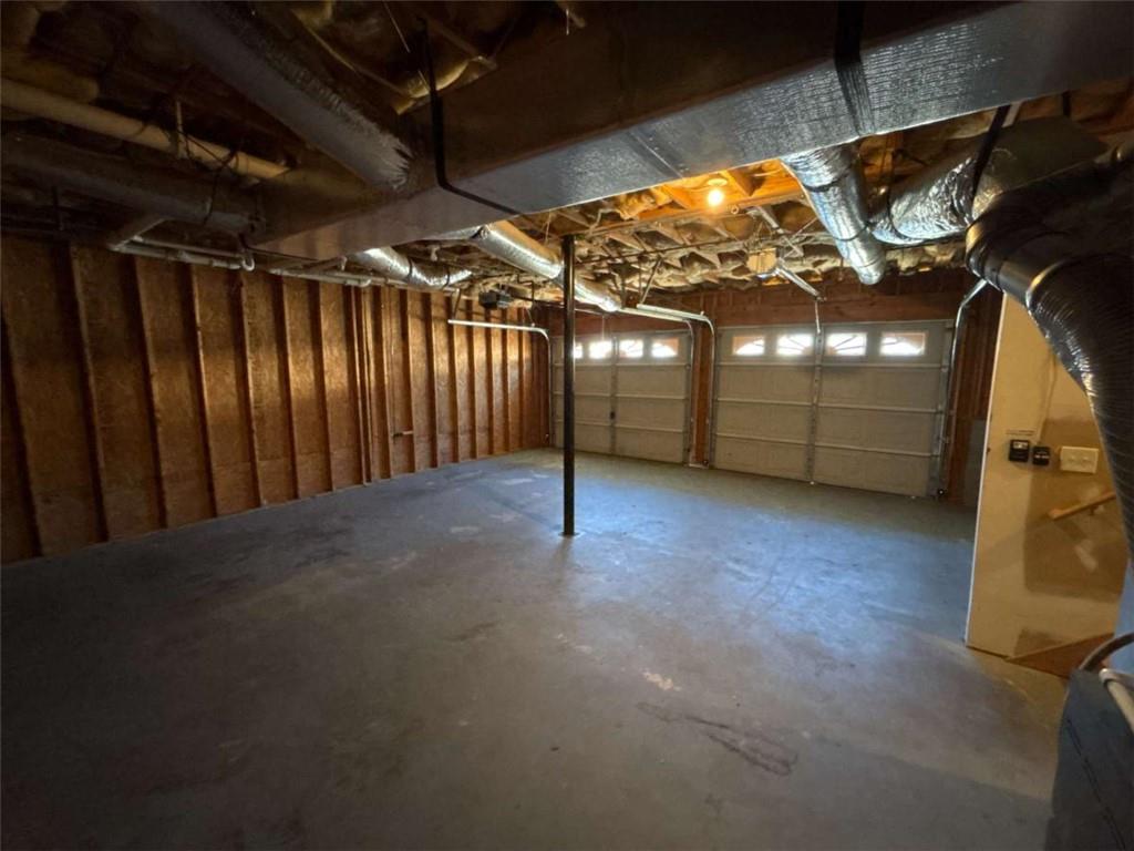 732 Newport Drive Villa Rica, GA 30180 - Photo 40 of 44 a view of a room with gym equipment
