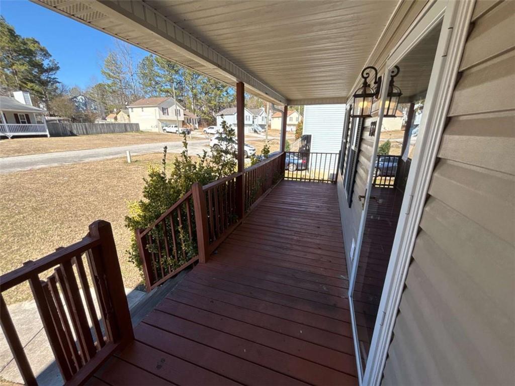 732 Newport Drive Villa Rica, GA 30180 - Photo 5 of 44 a view of a balcony with wooden floor