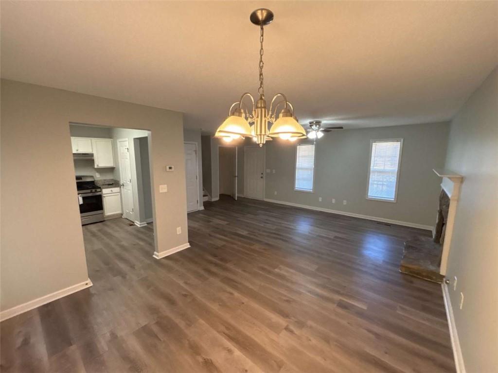 732 Newport Drive Villa Rica, GA 30180 - Photo 9 of 44 a view of a livingroom with wooden floor