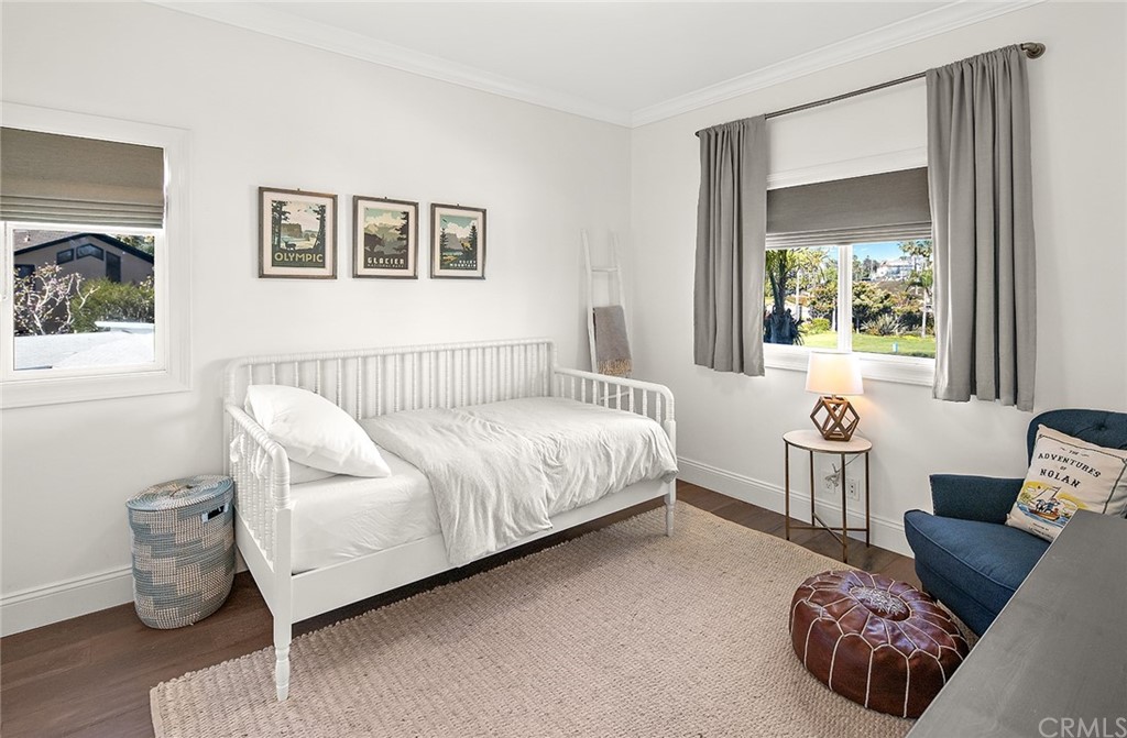 56 Balboa Newport Beach, CA 92663 - Photo 26 of 37 a bed room with a bed and a couch