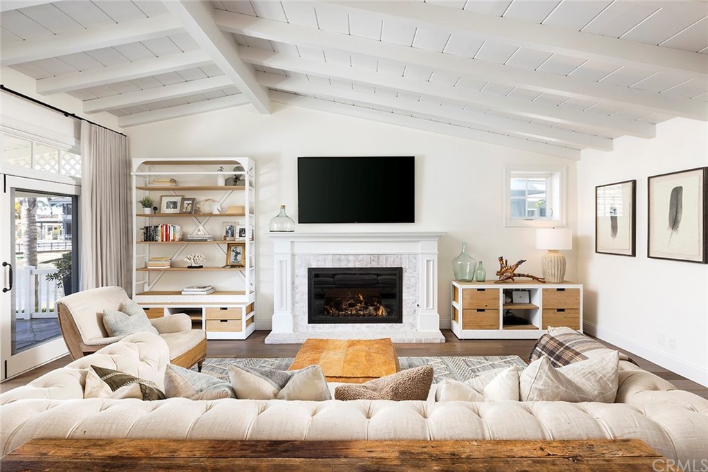 56 Balboa Newport Beach, CA 92663 - Photo 6 of 37 a living room with furniture fireplace and flat screen tv