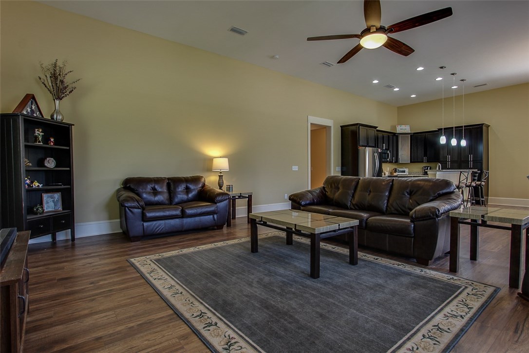 96155 Captains Pointe Road Yulee, FL 32097 - Photo 14 of 30 a living room with furniture and a rug