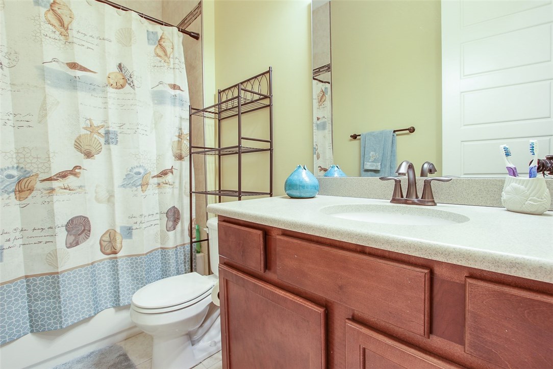 96155 Captains Pointe Road Yulee, FL 32097 - Photo 17 of 30 a bathroom with a sink a toilet and shower