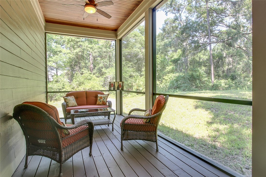 96155 Captains Pointe Road Yulee, FL 32097 - Photo 22 of 30 a living room with large window and furniture