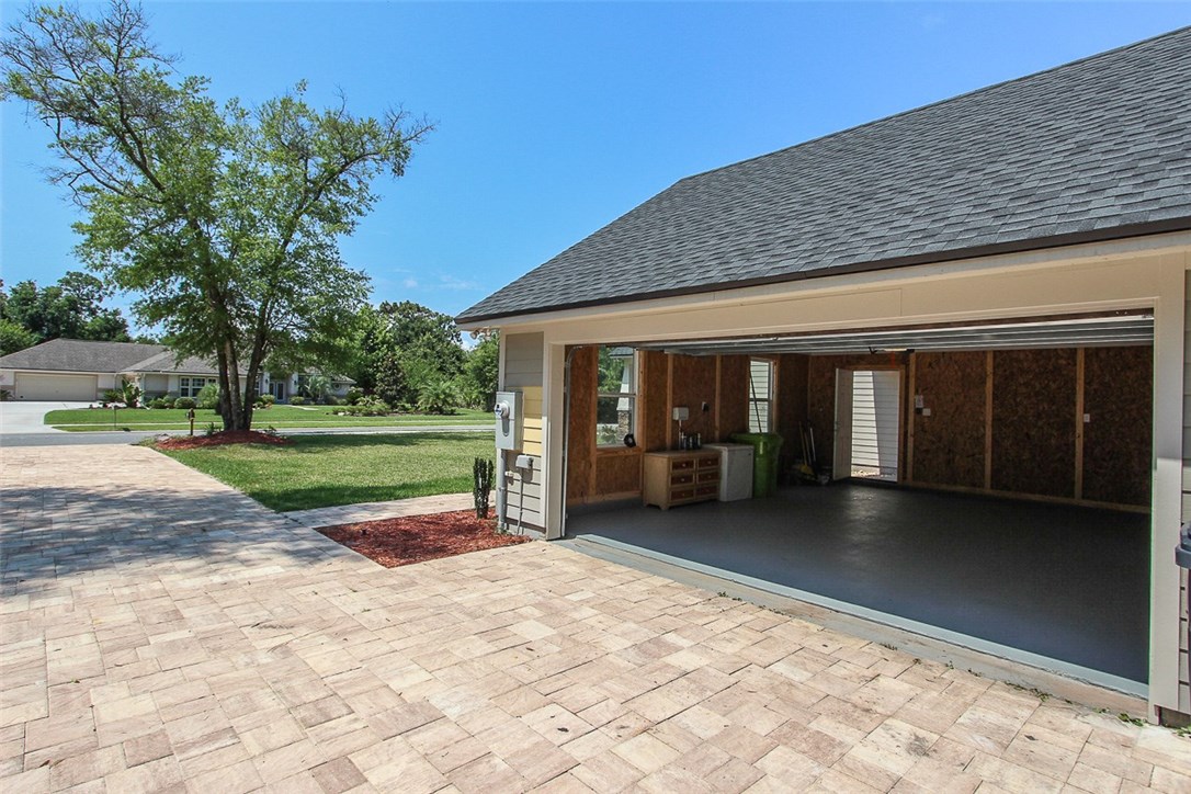 96155 Captains Pointe Road Yulee, FL 32097 - Photo 25 of 30 a view of a house with a porch