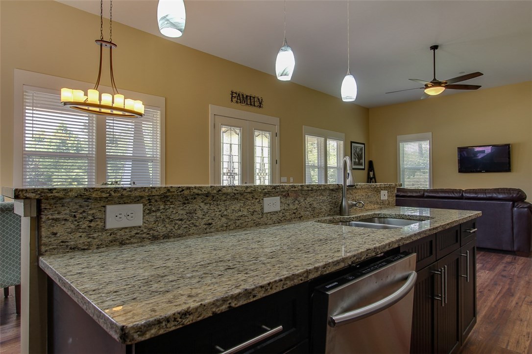 96155 Captains Pointe Road Yulee, FL 32097 - Photo 10 of 30 a bathroom with a granite countertop sink and a mirror