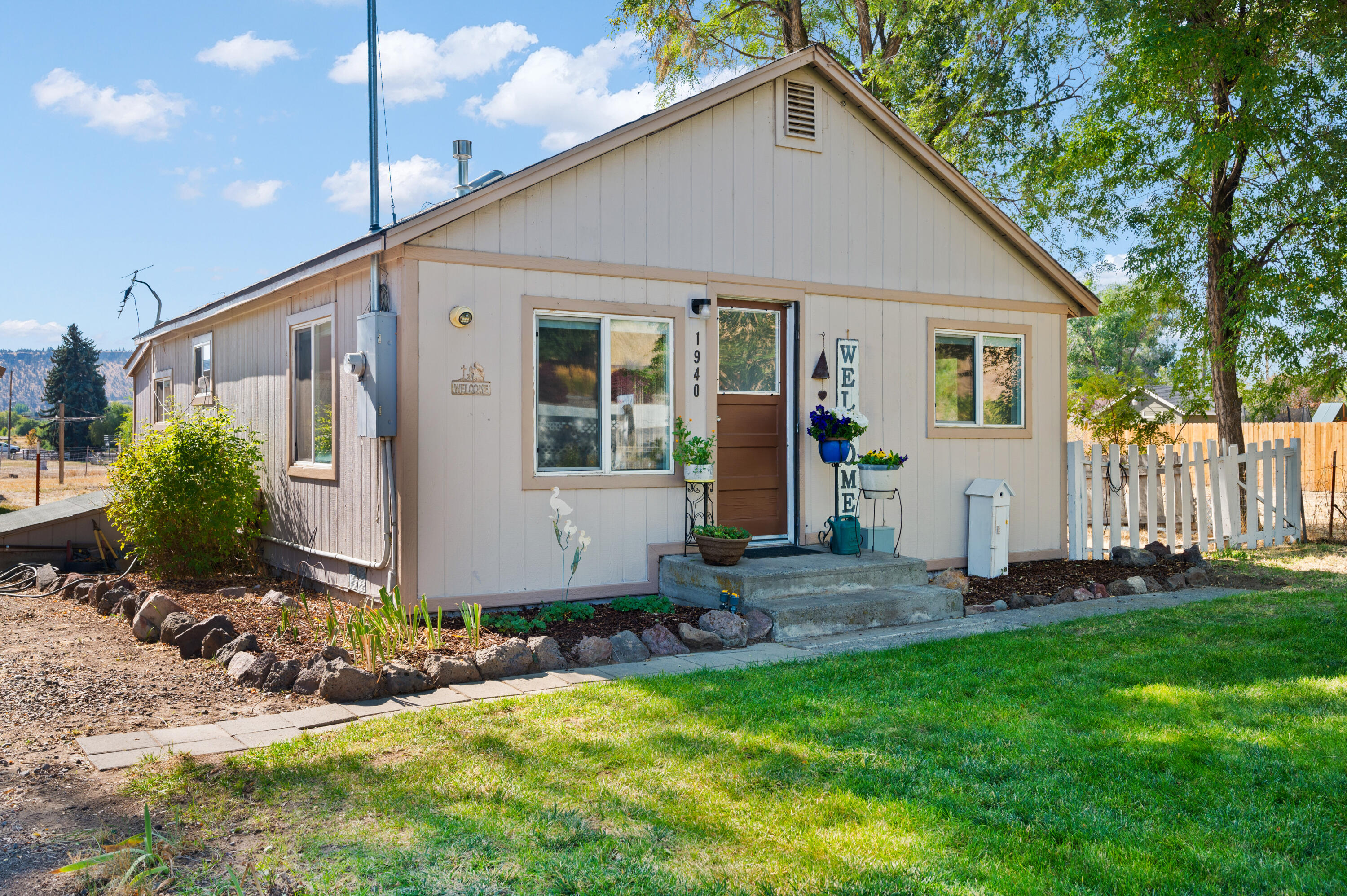 1940 Northeast Laughlin Road Prineville, OR 97754 - Photo 2 of 34 a view of a house with backyard