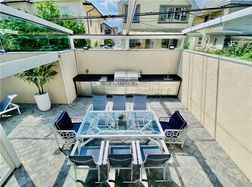 222 Exeter Street Brooklyn, NY 11235 - Photo 37 of 39 a view of balcony with couple of chairs