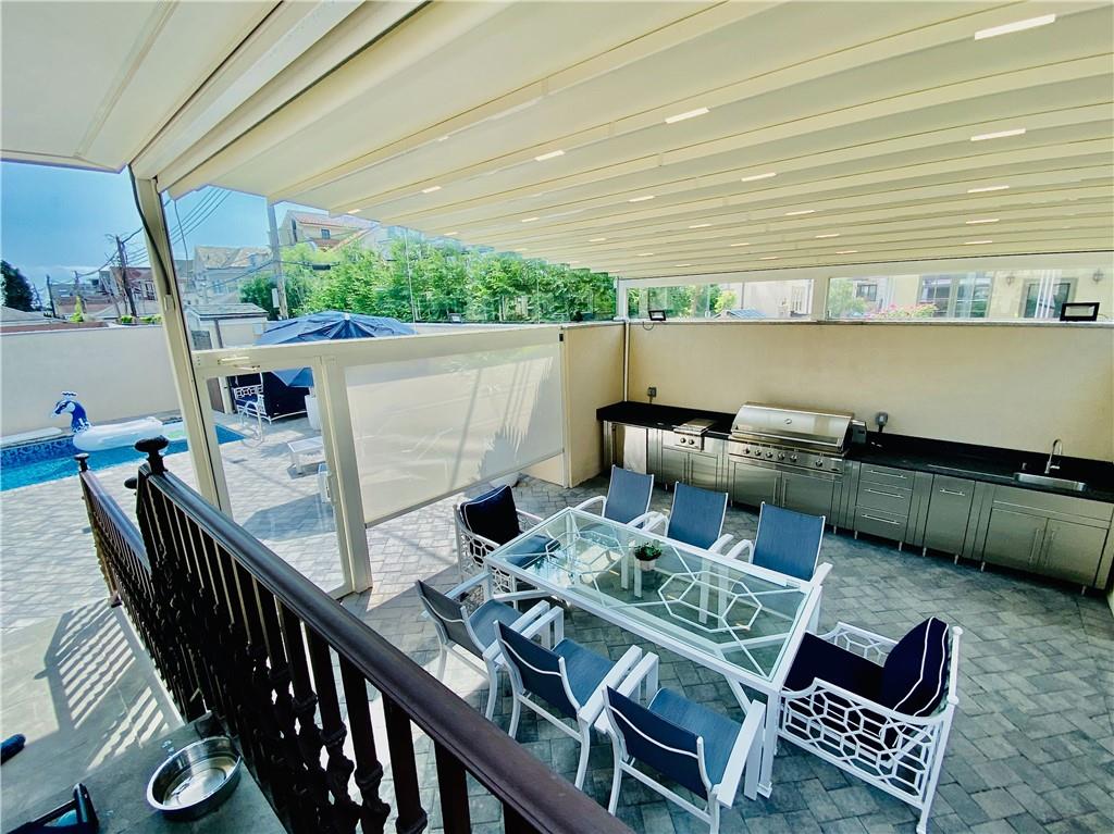 222 Exeter Street Brooklyn, NY 11235 - Photo 39 of 39 a balcony view with couple of chairs