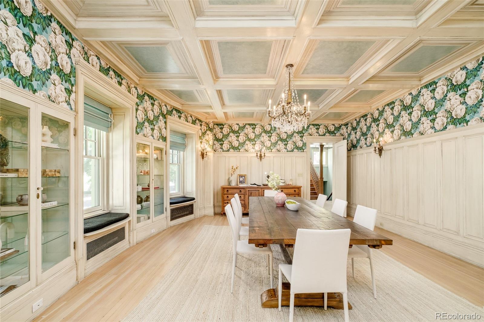 680 North Clarkson Street Denver, CO 80218 - Photo 14 of 39 a dining room with wooden floor table and chairs