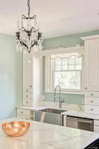 a view of entryway with furniture and wooden floor