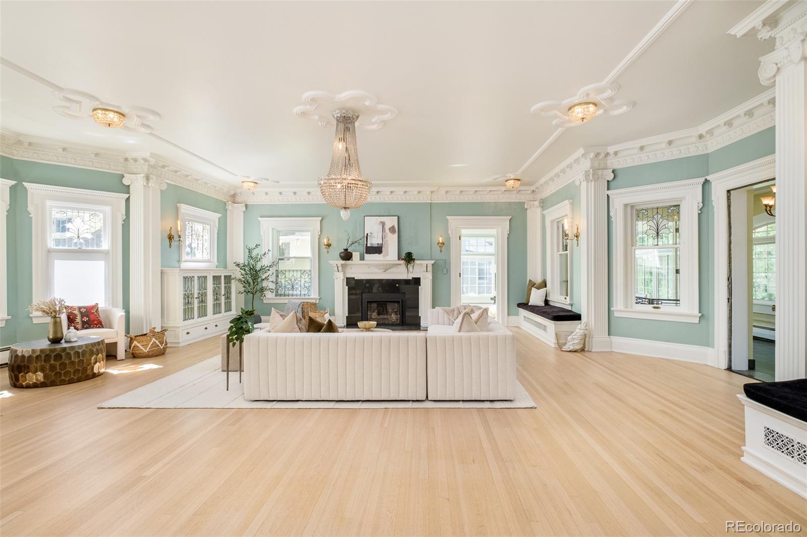 680 North Clarkson Street Denver, CO 80218 - Photo 2 of 39 a living room with furniture a fireplace and a large window
