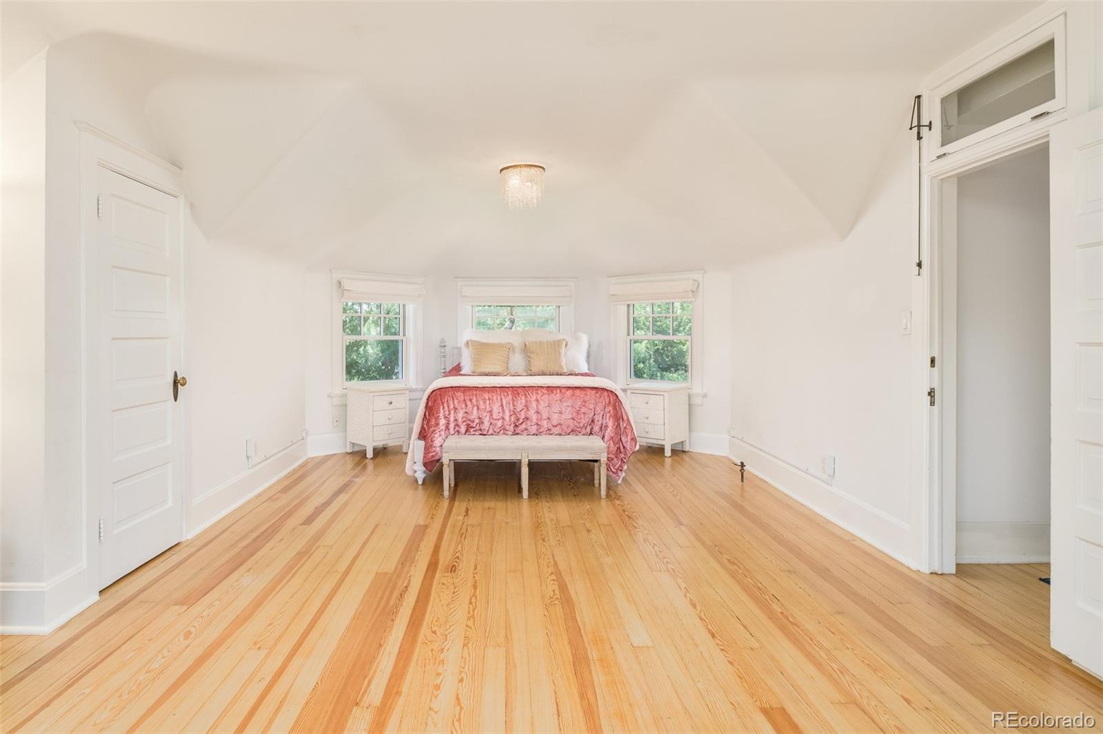 680 North Clarkson Street Denver, CO 80218 - Photo 33 of 39 a bedroom with a bed and a table