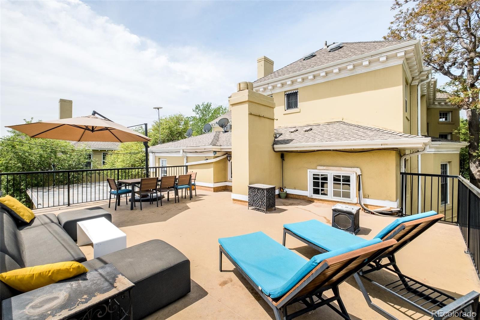 680 North Clarkson Street Denver, CO 80218 - Photo 35 of 39 a outdoor space with patio the couches and a barbeque