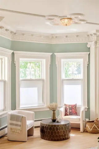 a view of entryway and hall with a mirror